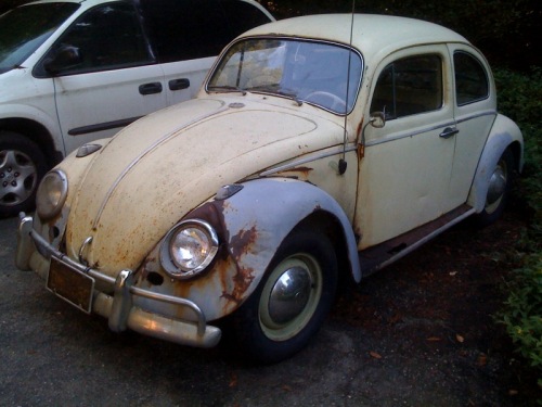 They pointed to a 1963 VW bug 1963VWBugDriversFront